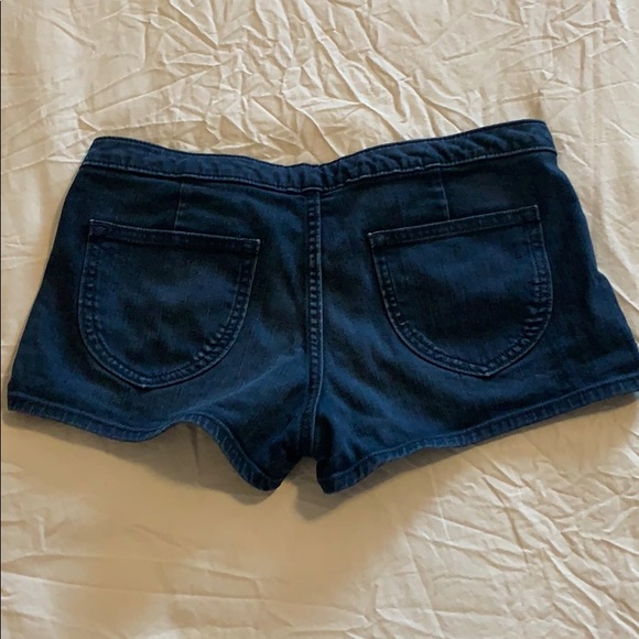 Dark blue pull on jean shorts with button accents - Picture 2 of 3